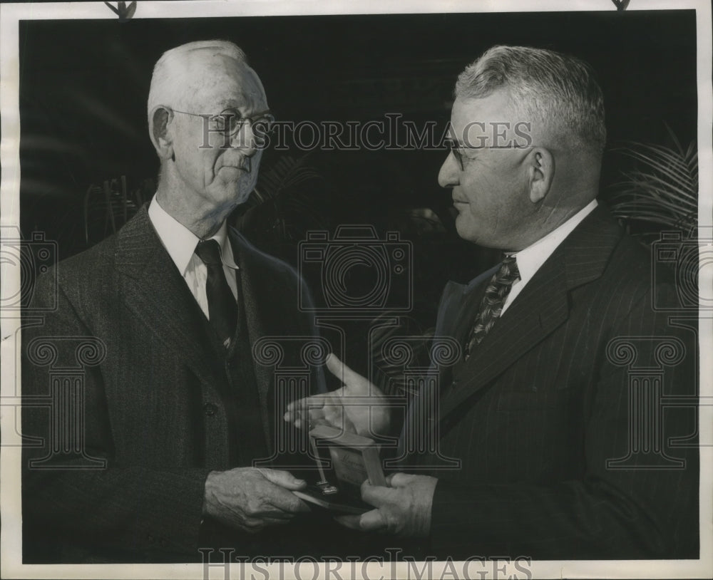 1946 T. C. Young, receives gold watch from Ed Norton, BIrmingham - Historic Images