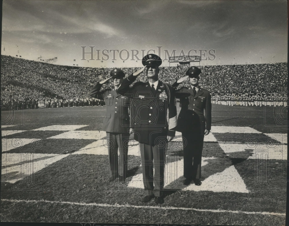 1965 Football Fans Cheer as Sgt. William Wooldridge Salutes Flag-Historic Images