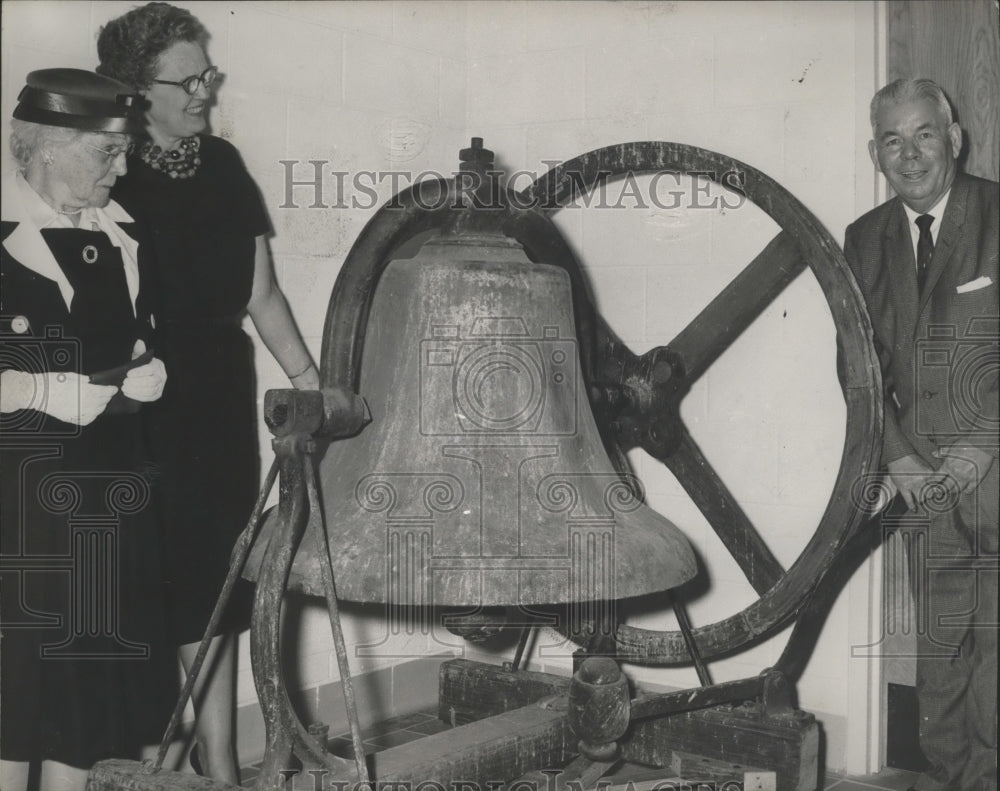 1961 Commissioner Sam Vanable rings bell, Hal Henderson School-Historic Images