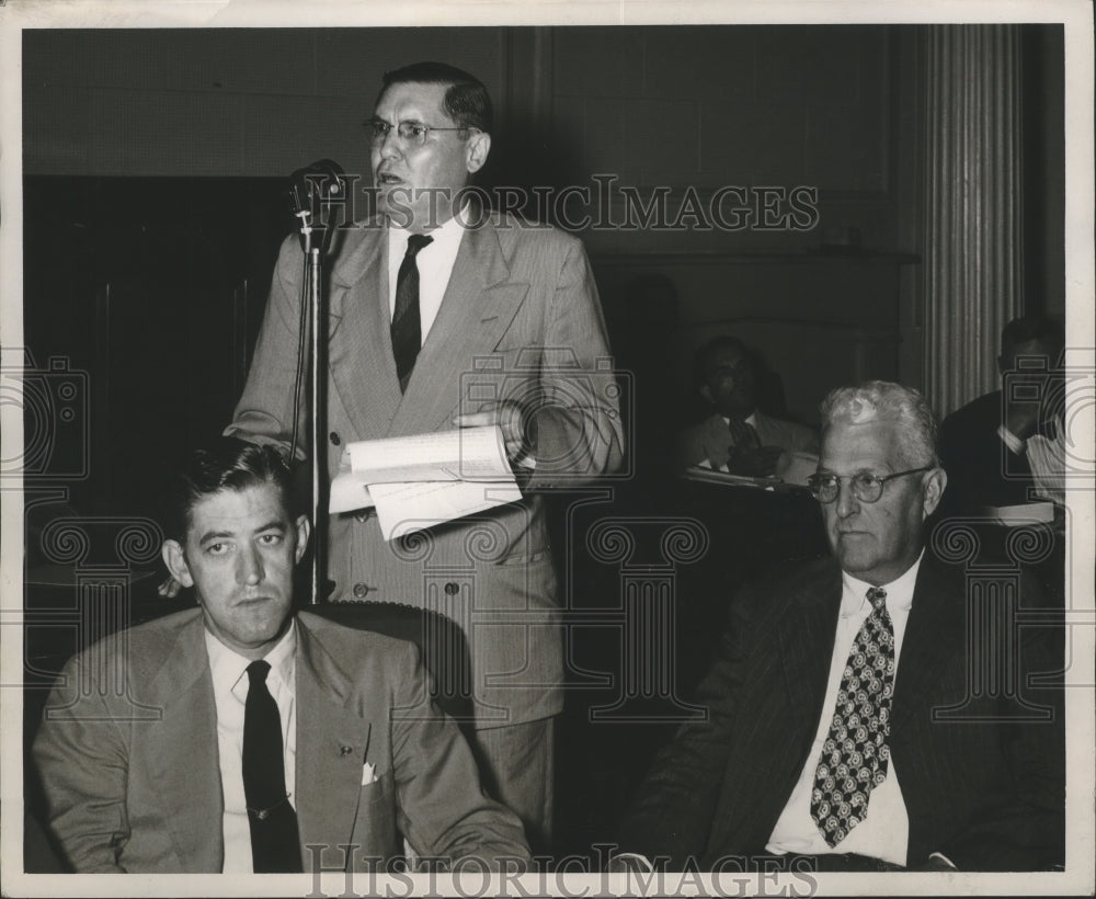 1947, Judge Chester Walker answers questions at a press conference - Historic Images