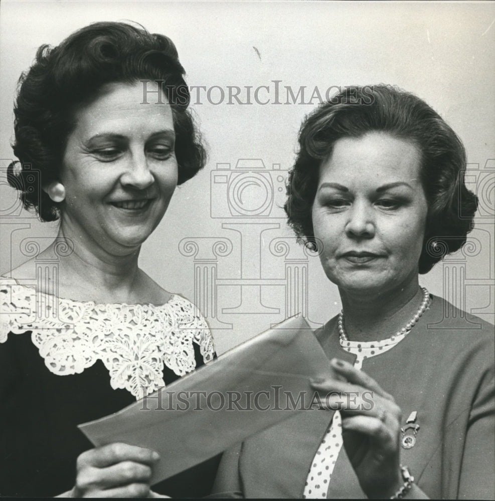 1965, PTA leader Mrs. Henry Wilkins holds prize money - abna19370 - Historic Images