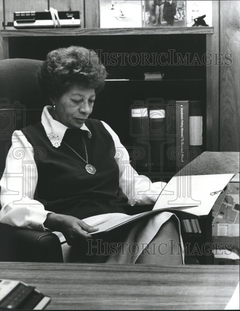 1981, Dr. Doris Williams, University of Alabama Dean, sits at desk - Historic Images