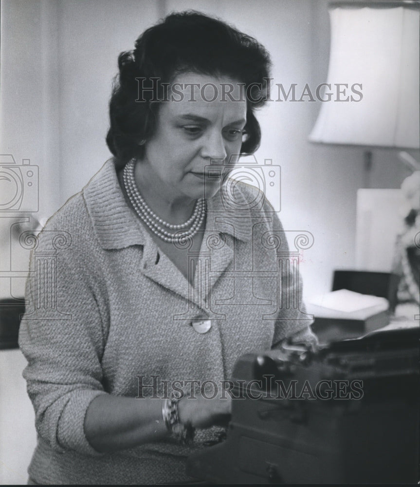 1964, Mrs. Mark J. Williamson, Clubwoman, working at her typewriter - Historic Images