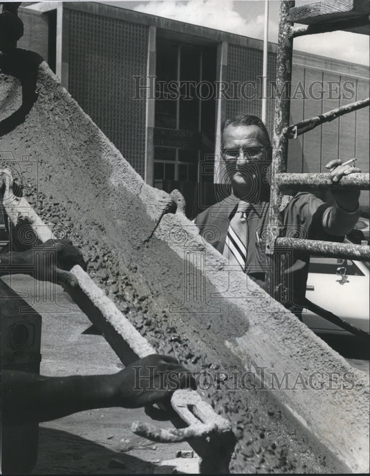 1974, Mayor Bennett watches concrete pour at city hall, Clanton, AL - Historic Images