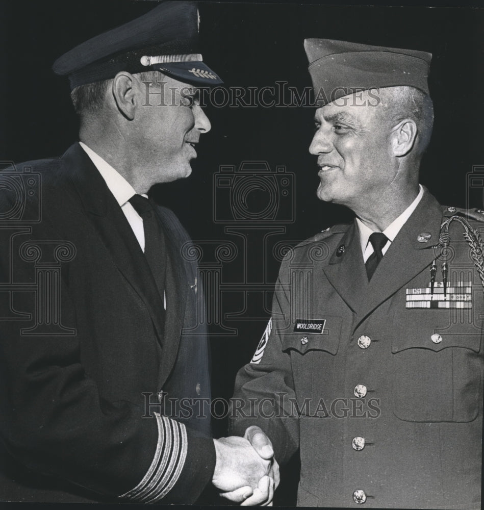 1965 Press Photo Sergeant Major William Wooldridge, shakes hand with man - Historic Images