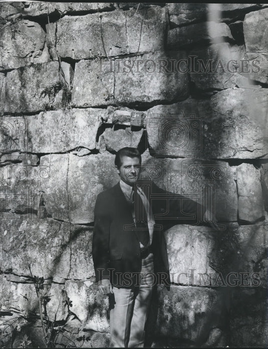 1972, James Walker, Historian, inspects Civil War damage to wall, AL - Historic Images