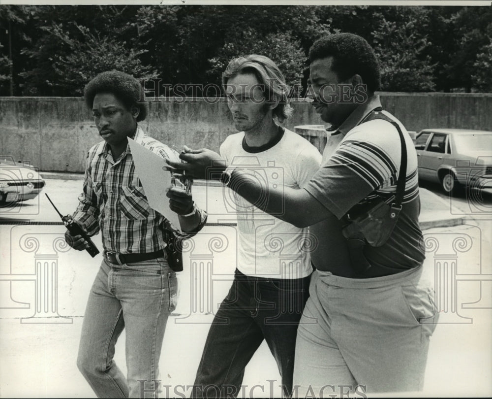 1982 Police Officers Escort Grover Lewis Biddie to Police Car - Historic Images