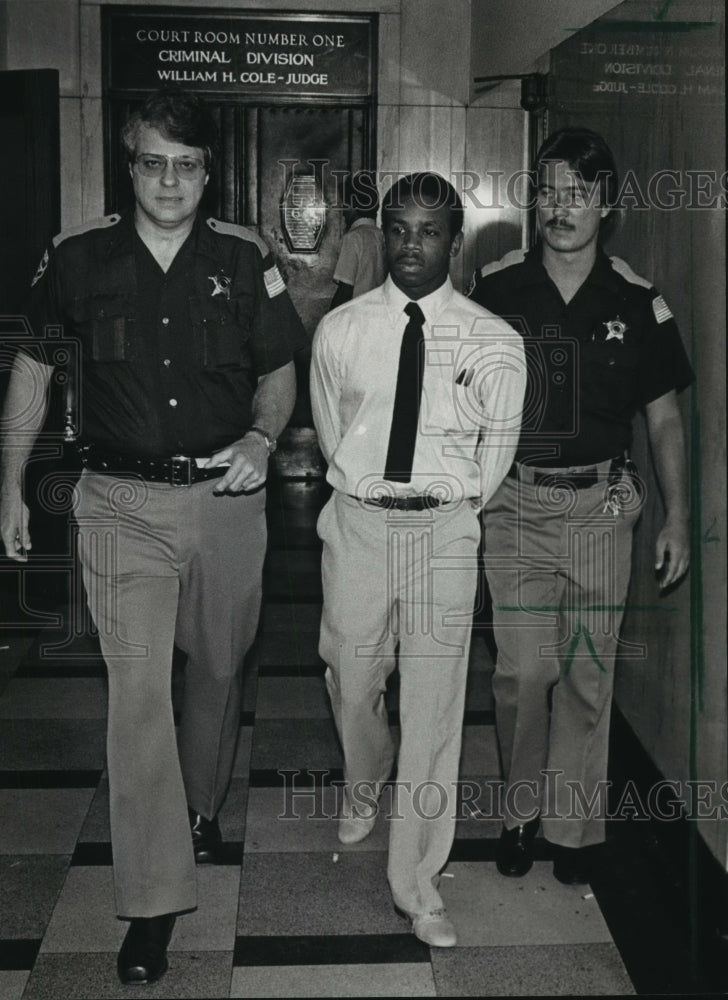 1987, Bailiffs leading R. Bighames from courtroom, Alabama - Historic Images