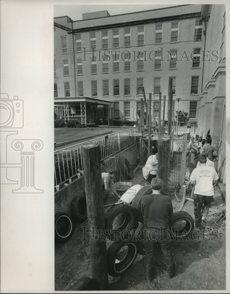 1987 People build playground at Southside Baptist Church, Birmingham - Historic Images