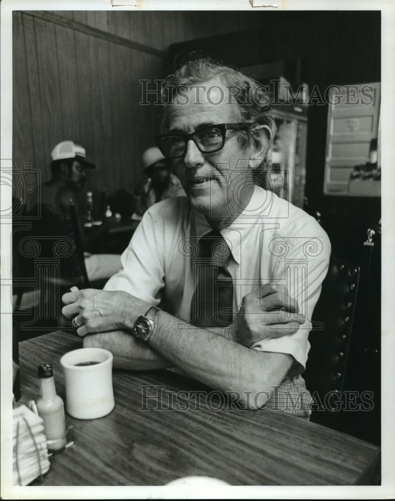 1979, Greene County District Judge Ralph Banks drinks coffee - Historic Images