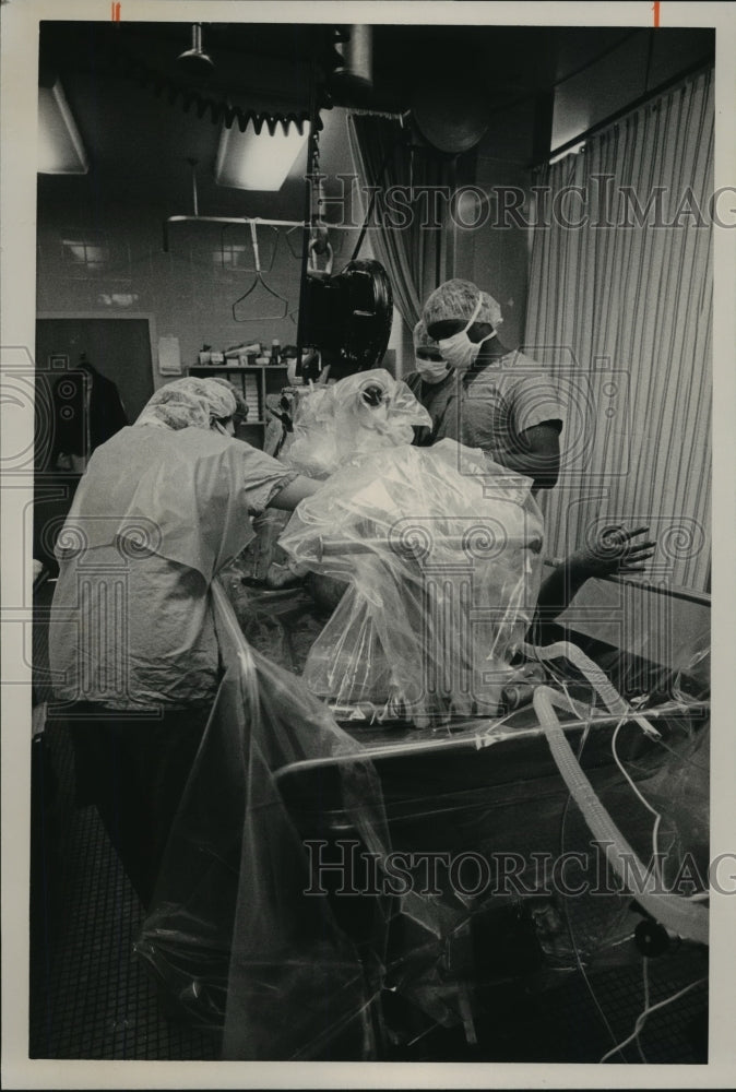 1987, Patient Treated in Burn Tank, University of Alabama Hospital - Historic Images