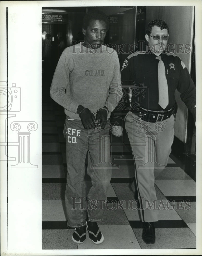 1981 Charles Bennett is escorted by Bailiff Chris Galbaugh - Historic Images