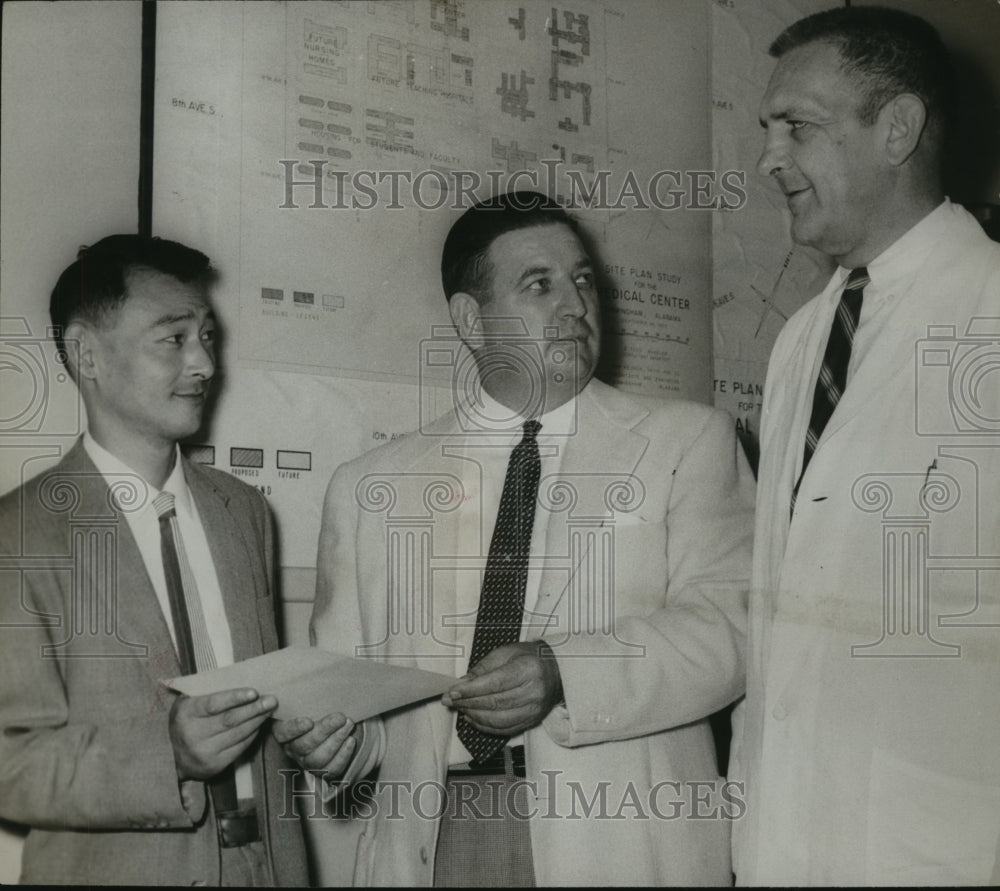 1957 Press Photo Dr, Yoh Imai gets cancer grant from J. C. Sergeant, Jr, Alabama - Historic Images