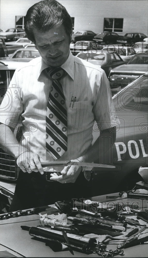 1981 Rhodes Displays Weapons Outside Birmingham, Alabama School - Historic Images