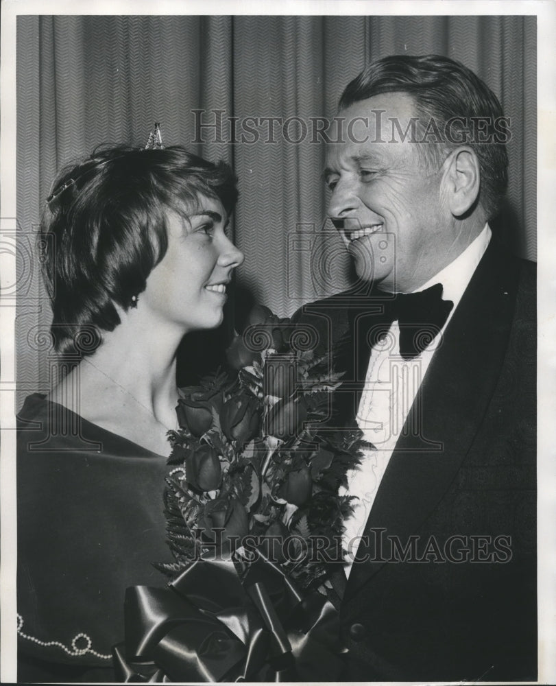 1975, Ben Brown Congratulates Laine Smith on winning of Samford Crown - Historic Images