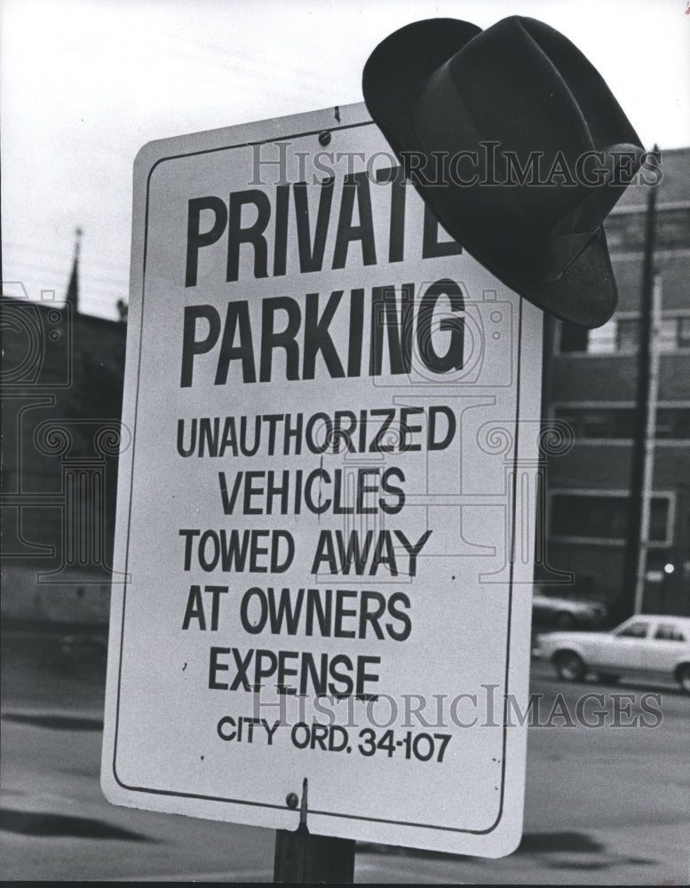 1978 Hat on &quot;Private Parking&quot; sign at Birmingham,Alabama parking lot - Historic Images