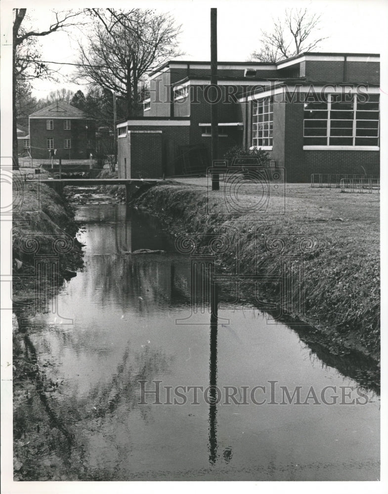 1985 Polluted stream near James A. Davis School, Bessemer - Historic Images