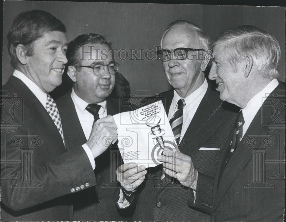 1975, Dr.Buris Boshell , Director of Diabetes Research holds guide - Historic Images