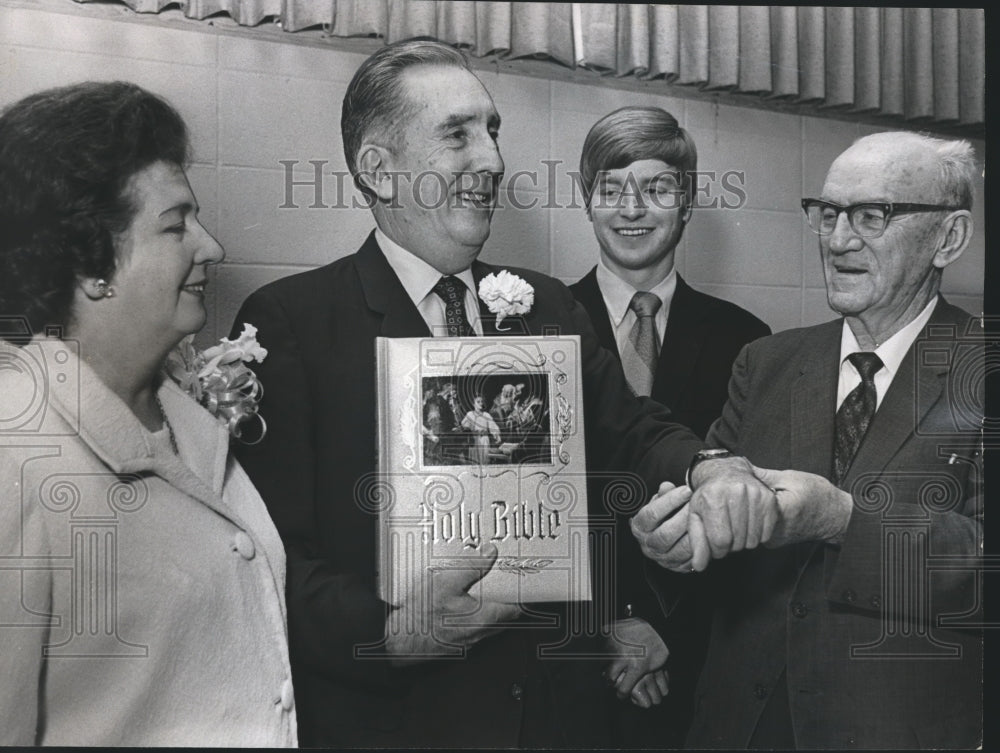 1971 Doctor LeRoy Brown, with others, receives Bible, Alabama - Historic Images