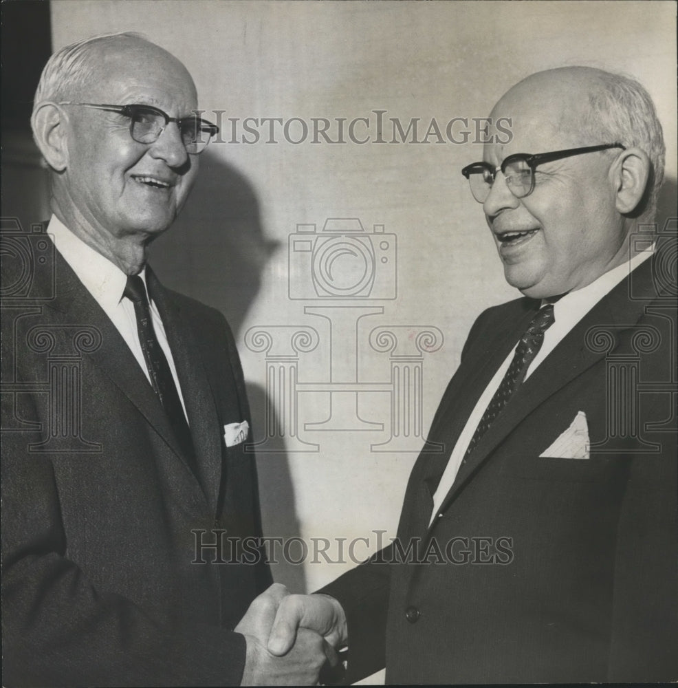 1961 Press Photo Grover C. Brant, congratulated by Percy J. Trevethan, Goodwill - Historic Images