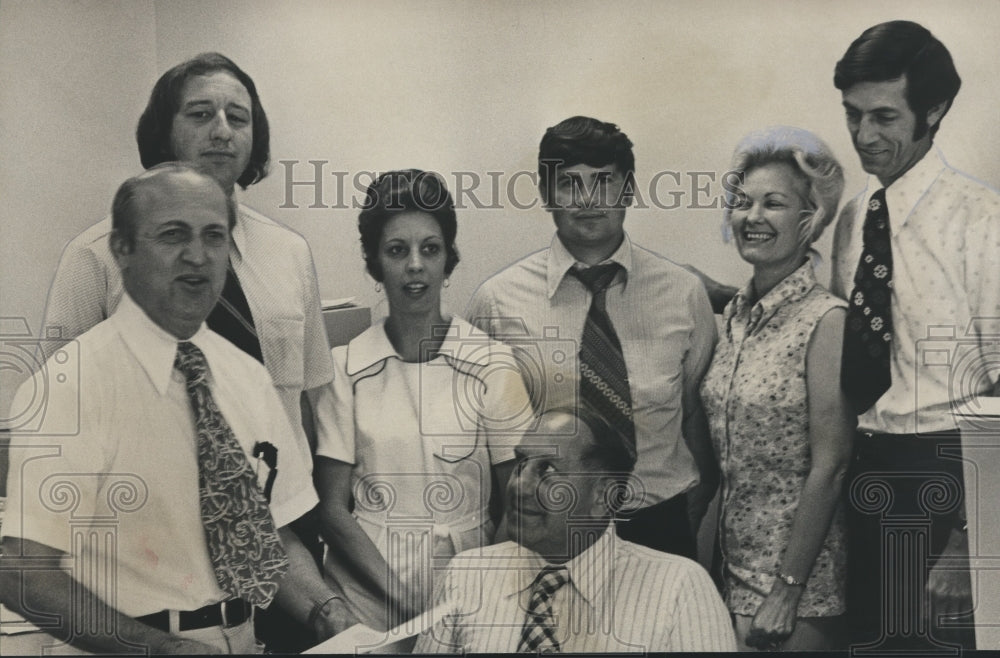 1974 Press Photo Paul J. Brignet reads award letter to staff, and Others - Historic Images