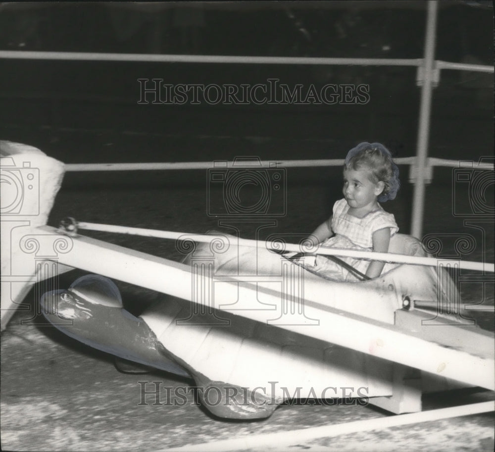 1959, Girl on Swans and Turtle ride at the fair, Birmingham, Alabama - Historic Images