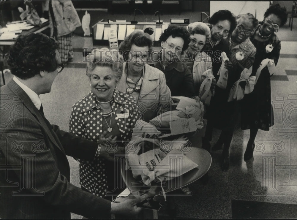 1978 John Buchanan collects donations for Heart Sunday, Alabama - Historic Images