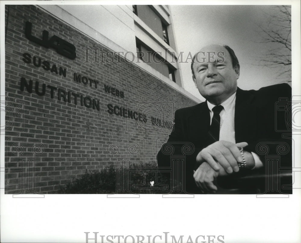 Press Photo Susan Mott Webb Nutrition Sciences Building with Man standing - Historic Images