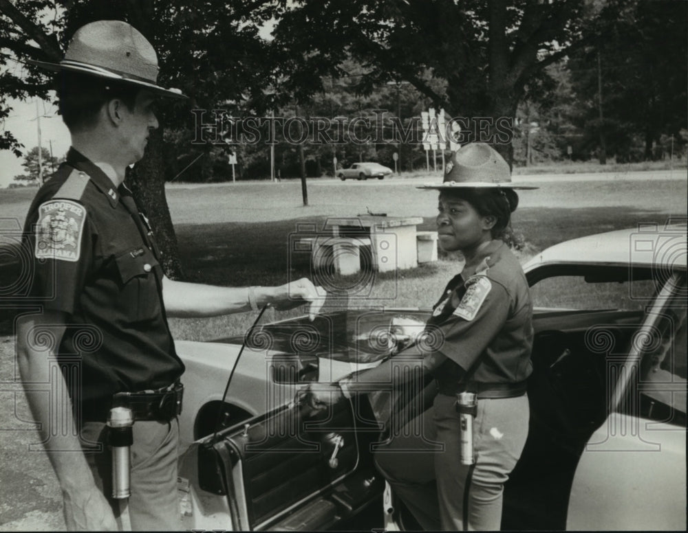 1979 Alabama State Trooper Clara Zeigler and Capt. George Jones - Historic Images