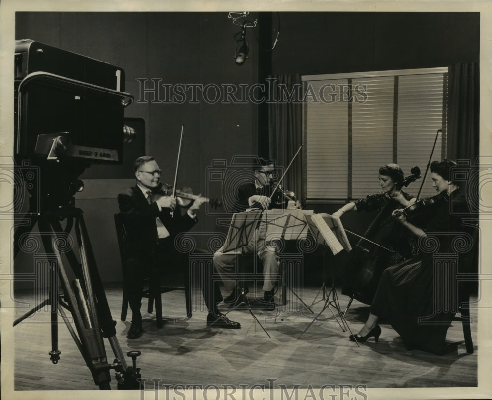 1956, The University of Alabama String Quartet is shown in rehearsal - Historic Images