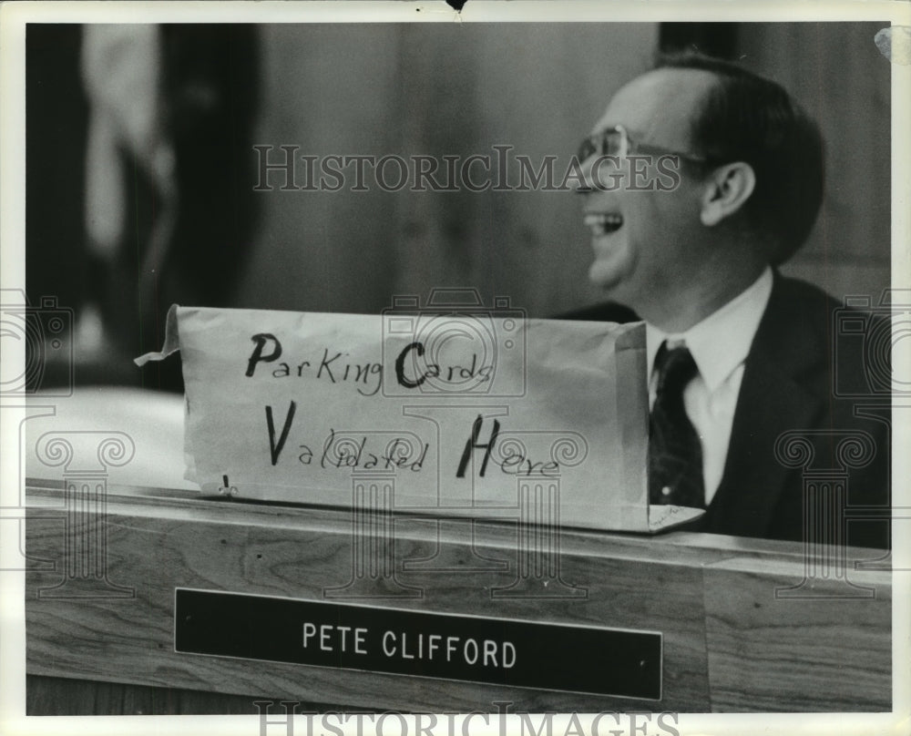 1980, Pete Clifford laughs at sign at Birmingham City Council - Historic Images