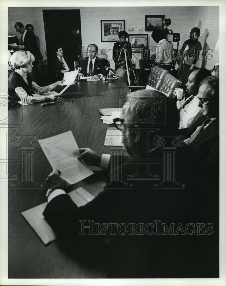 Press Photo Group of People at a Meeting in an Office with Cameras - abna23843 - Historic Images