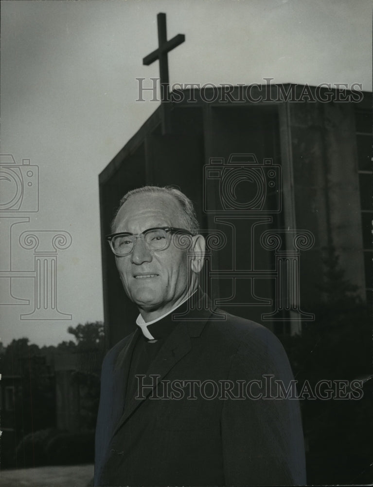 1973, Right Reverend Monsignor Herman C. Cazalas in front of church - Historic Images