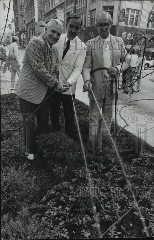 1973, City officials watering the Birmingham Green, Birmingham - Historic Images