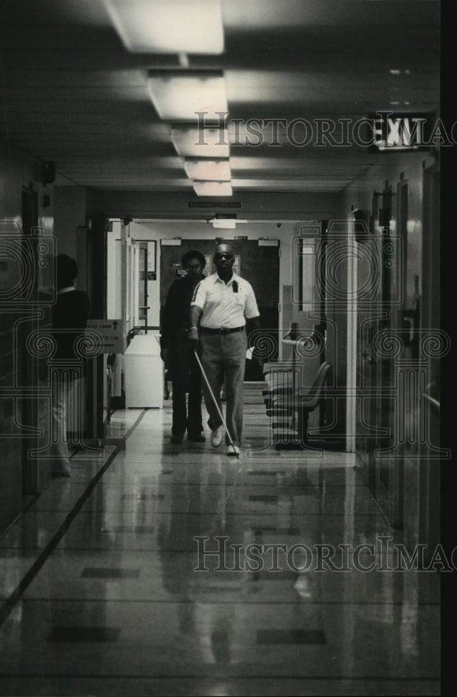 1983 Samuel Easley with blind patient at VA Blind Center Birmingham - Historic Images