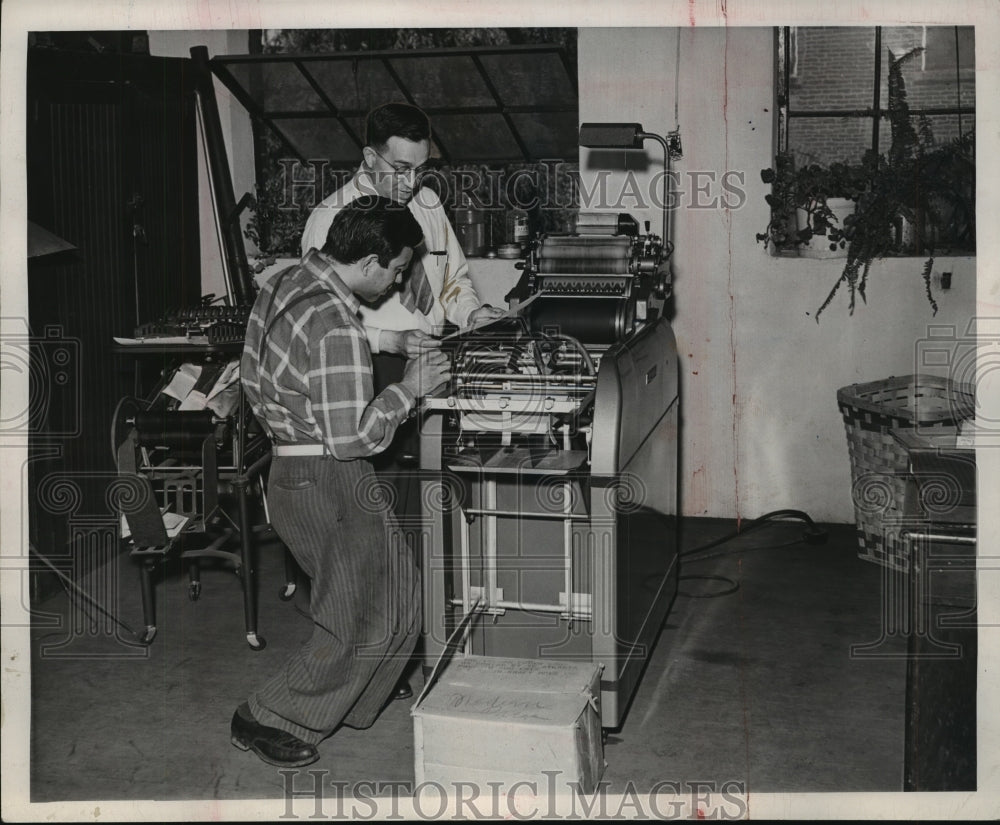 1947 Two Men Work on Equipment, Goodwill Industries, Birmingham, AL - Historic Images