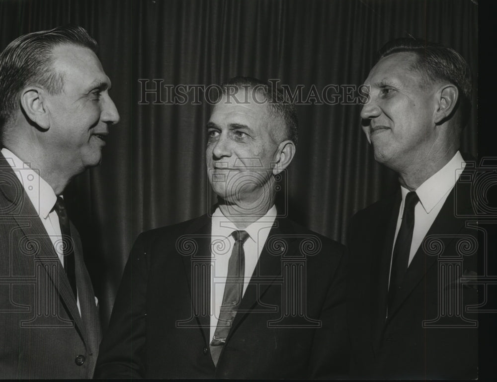 1965 Press Photo Educator Dr. Raymond Christian talks with others - abna24426 - Historic Images