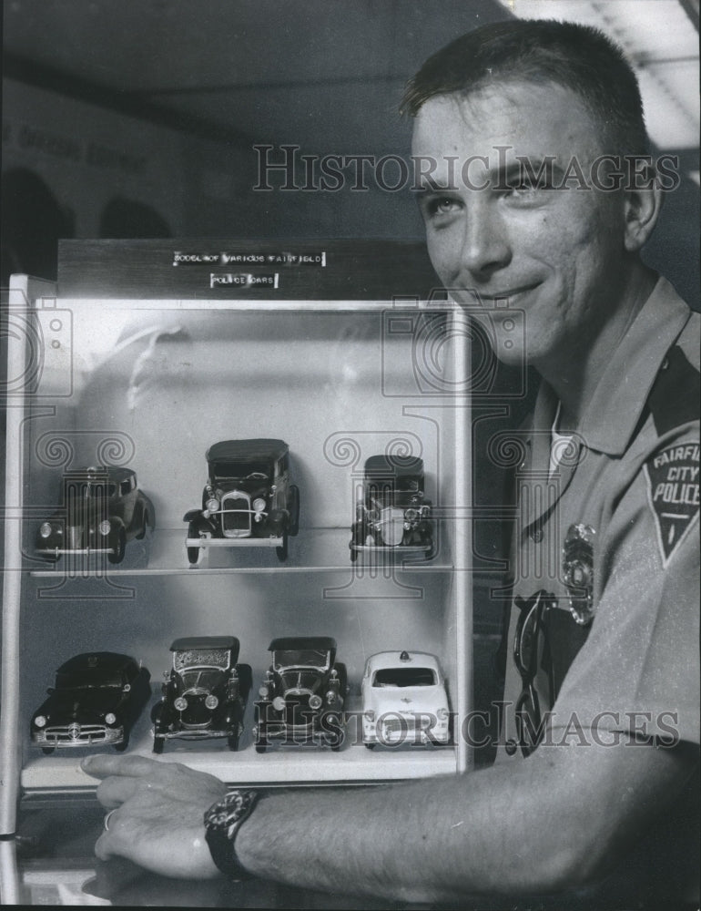 1967 Press Photo Fairfield Police Officer Allen Davis at Police Car Display - Historic Images