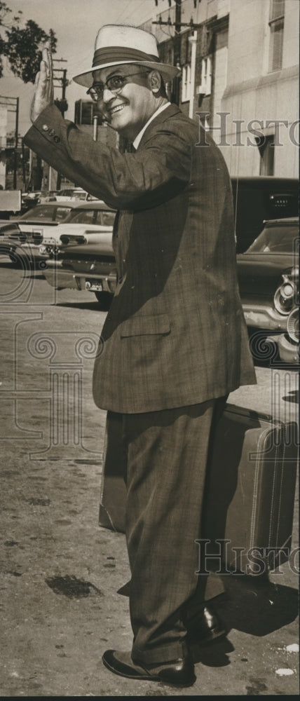 1962 Press Photo Sam Webb of Teamster's Union on street with luggage - abna24740 - Historic Images