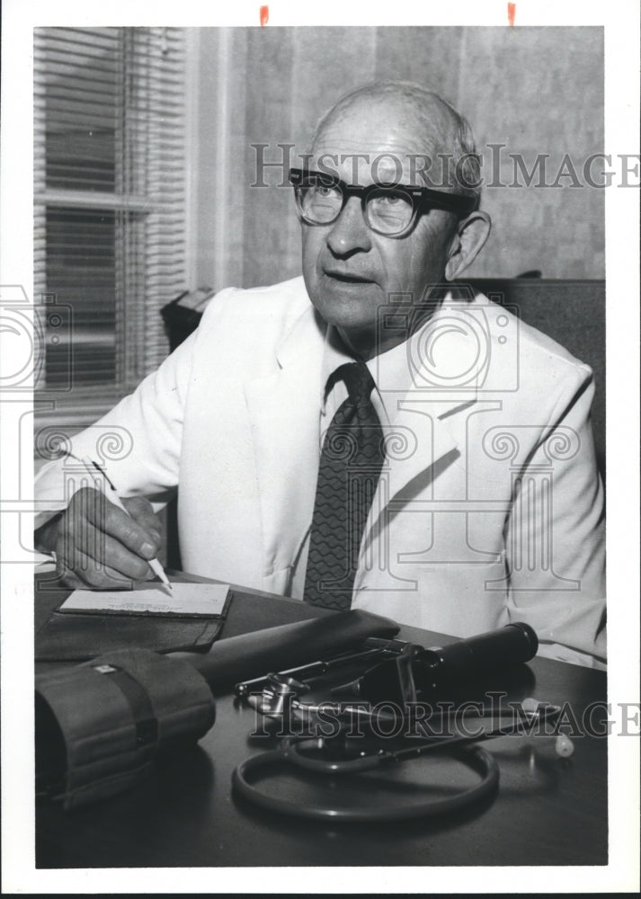 1979 Dr. William B. Turk, Auburn University, writes prescription - Historic Images