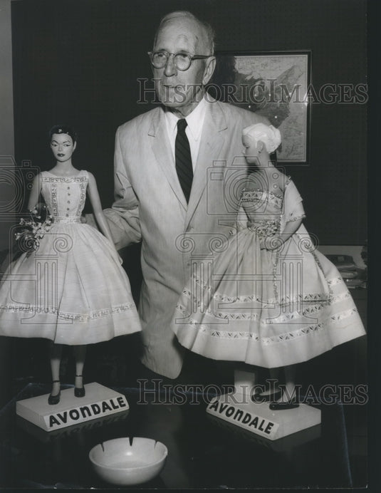 1957, Donald Comer Sr., cotton 'king', with dolls in cotton clothing - Historic Images