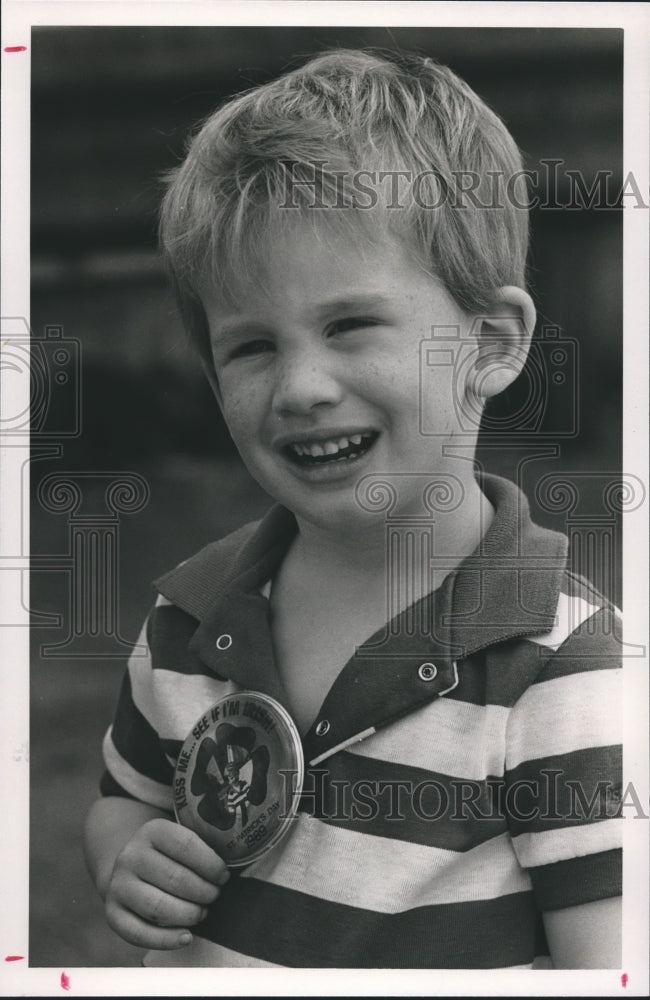 1989 Josh Tice, age 3, on Saint Patrick's' Day with Button - Historic Images
