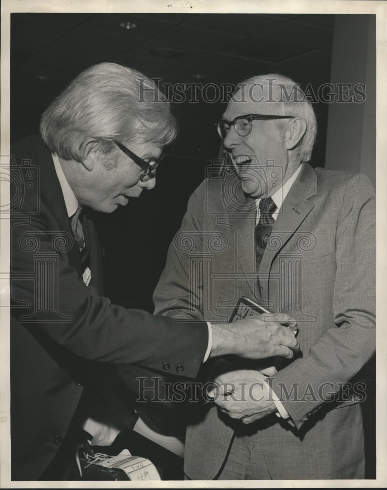 1974 Press Photo Former C. I. A. Miles Copeland and William A. Price shake hands - Historic Images