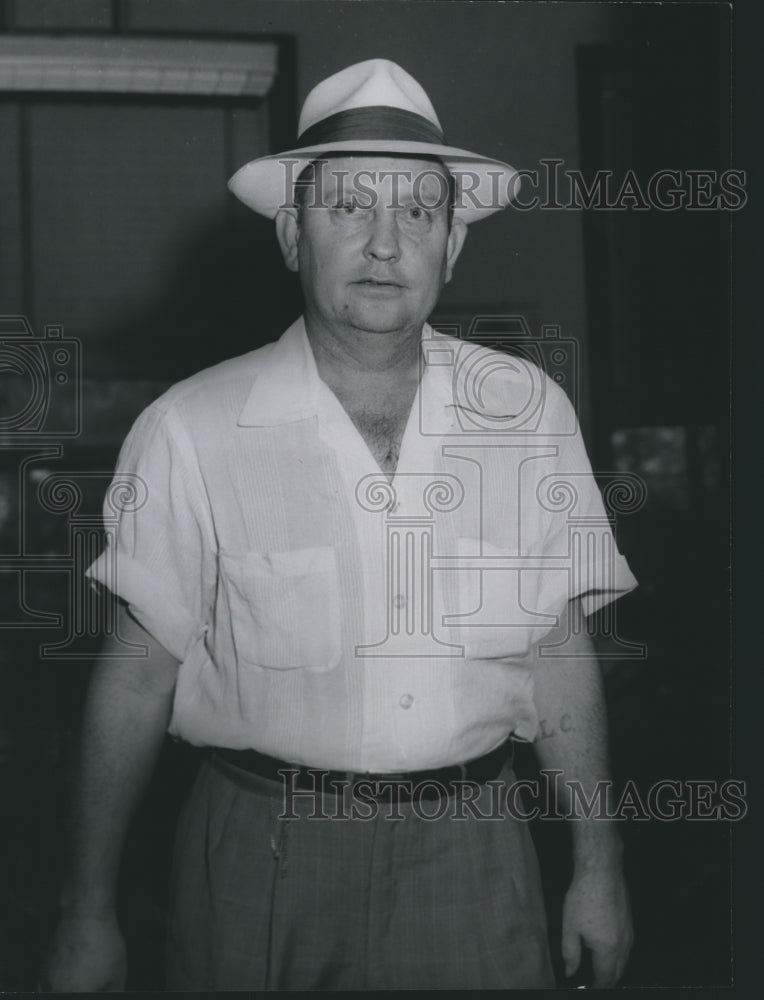 1954 E.L. "Red" Cook Leaves Sheriff's Office in Alabama - Historic Images
