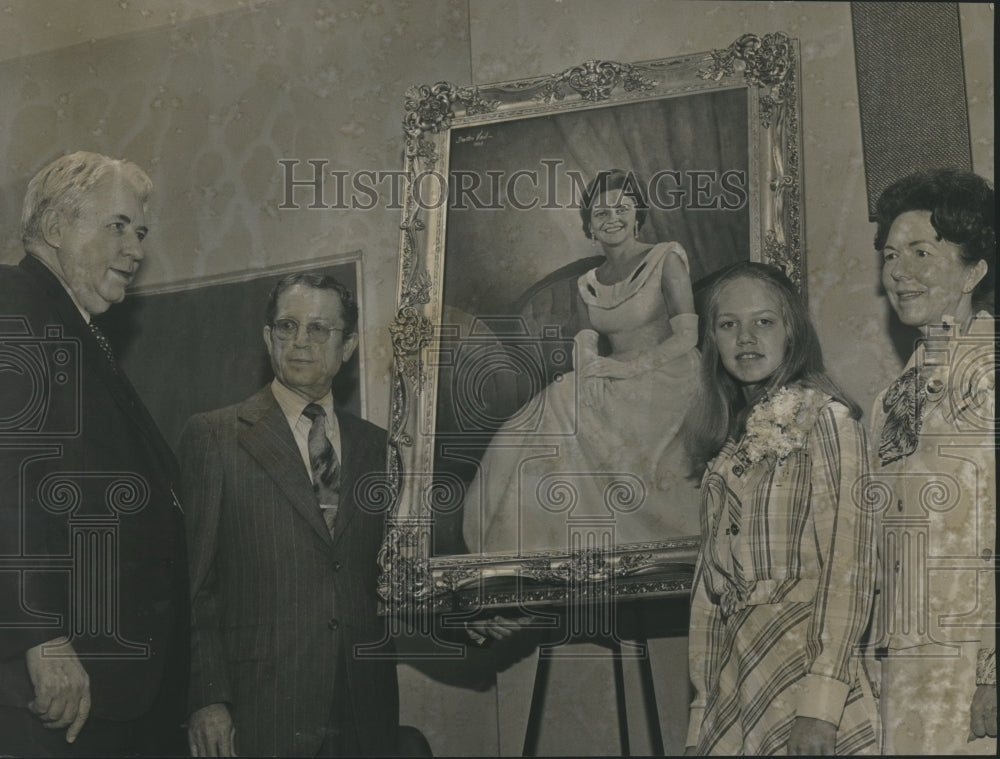 1975, Lee Wallace beside portrait of Governor Lurleen Wallace - Historic Images