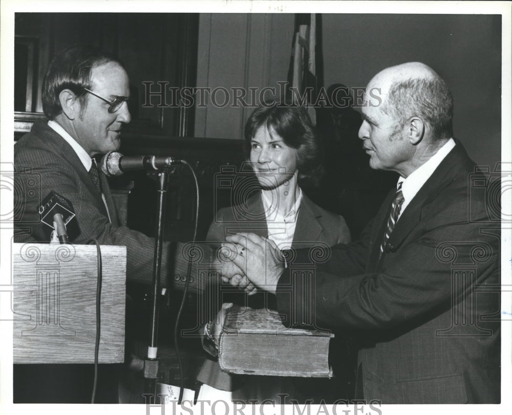 1982, Governor James shakes hands with Dr. Thomas Bartlett - Historic Images