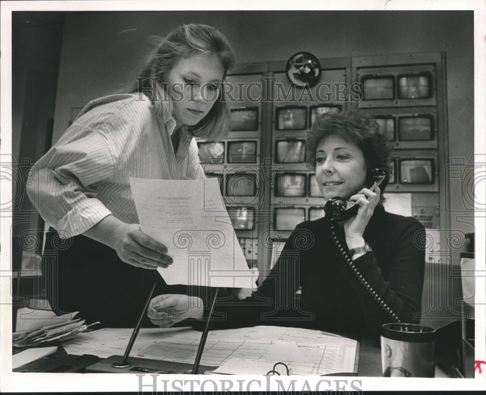 1986, Marshals Ann Cooper and Isabel Querry work in office - Historic Images