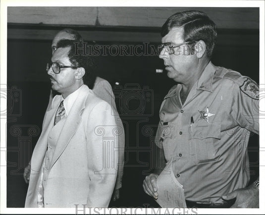 1982 Deputy Andy Cooper with others in hallway - Historic Images