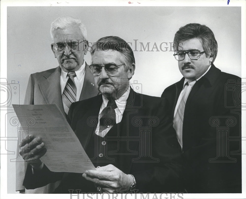 1982, Clergyman Dr. Padgett Cope reads form - abna25670 - Historic Images