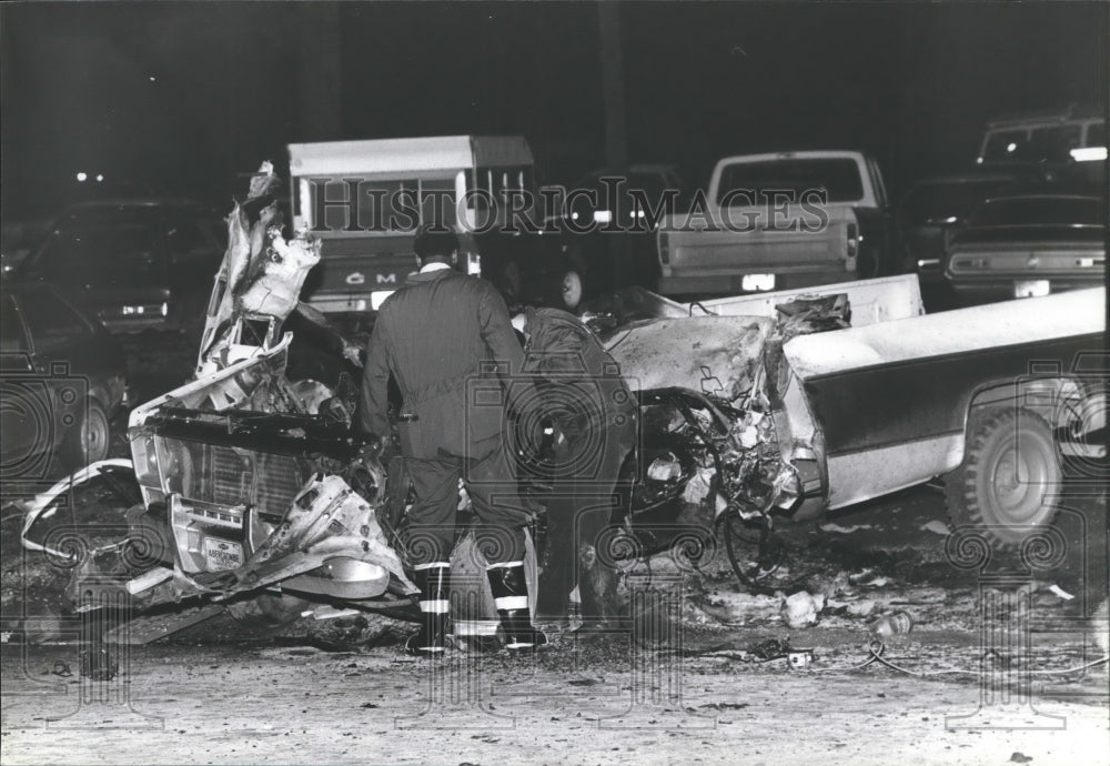 1980 Investigators Inspect Demolished Truck - Historic Images